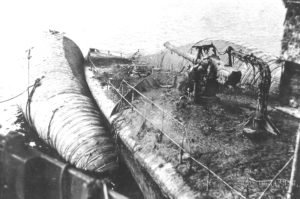 A raised destroyer with a 'Camel' attached for buoyancy. 